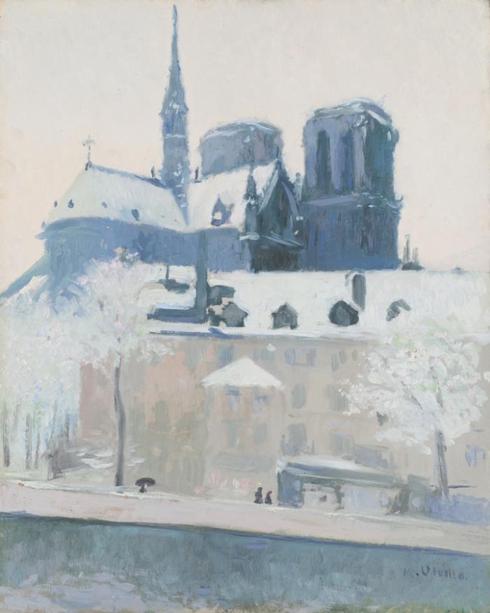 View of the apse of Notre Dame de Paris under the snow